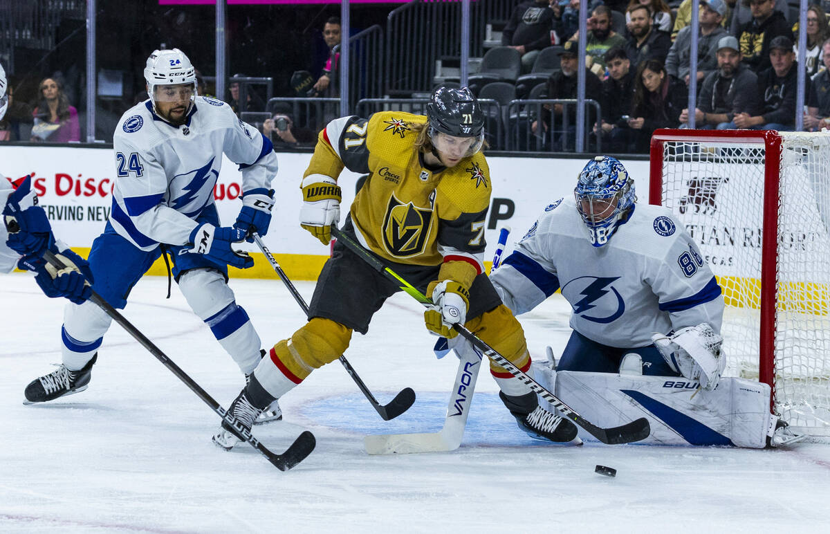 Golden Knights center William Karlsson (71) looks to take a shot against Tampa Bay Lightning go ...