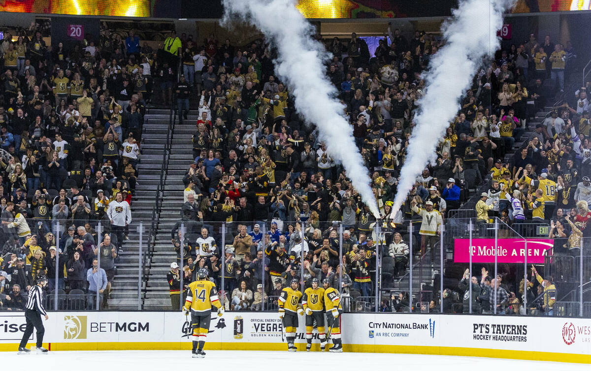 Golden Knights players celebrate a goal against the Tampa Bay Lightning during the second perio ...