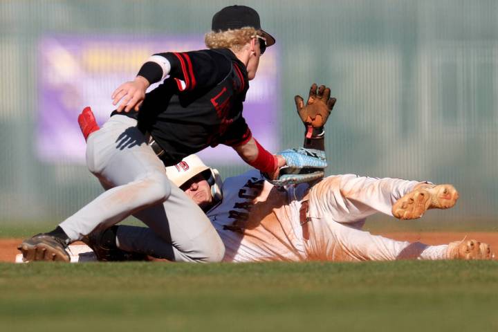 Las Vegas’ second baseman Kyle Iverson attempts to out Desert Oasis’ Ryan Martin ...