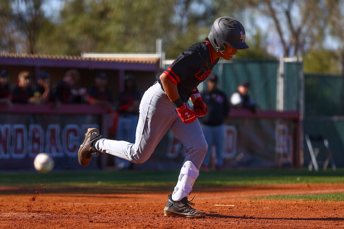 Las Vegas’ Aadyn Jaime runs to first base during a high school baseball game against Des ...