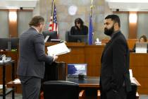 Athar Haseebullah, right, executive director for the ACLU of Nevada, Attorney Jacob Smith, left ...