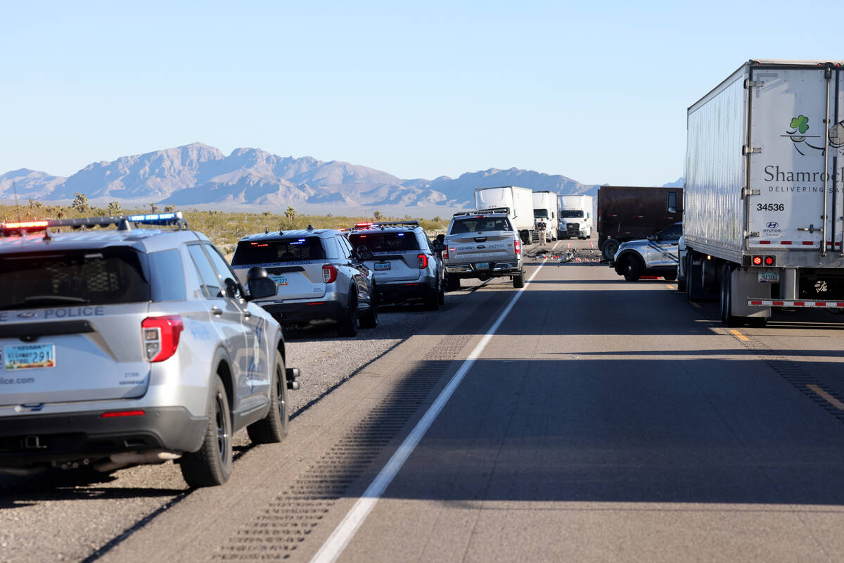 The Nevada Highway Patrol investigates a fatal crash involving a semi-truck and a passenger car ...