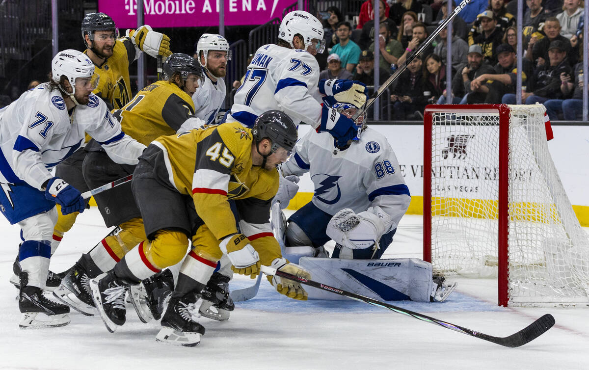 Golden Knights center Ivan Barbashev (49) just misses a goal past Tampa Bay Lightning goaltende ...