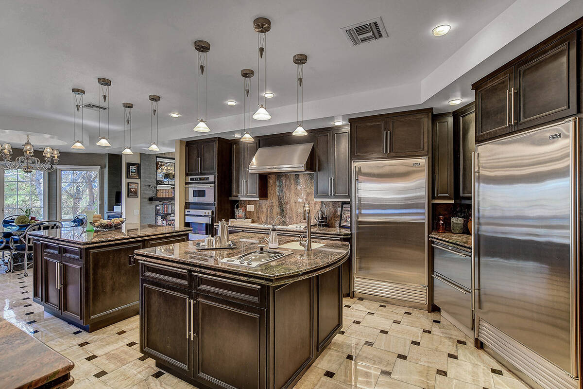 The main house features a large kitchen with two islands. (Desert Sun Realty)