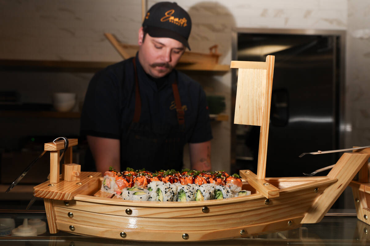 Sushi is served in a wooden boat during an opening night party at Emmitt's Vegas in Fashion Sho ...