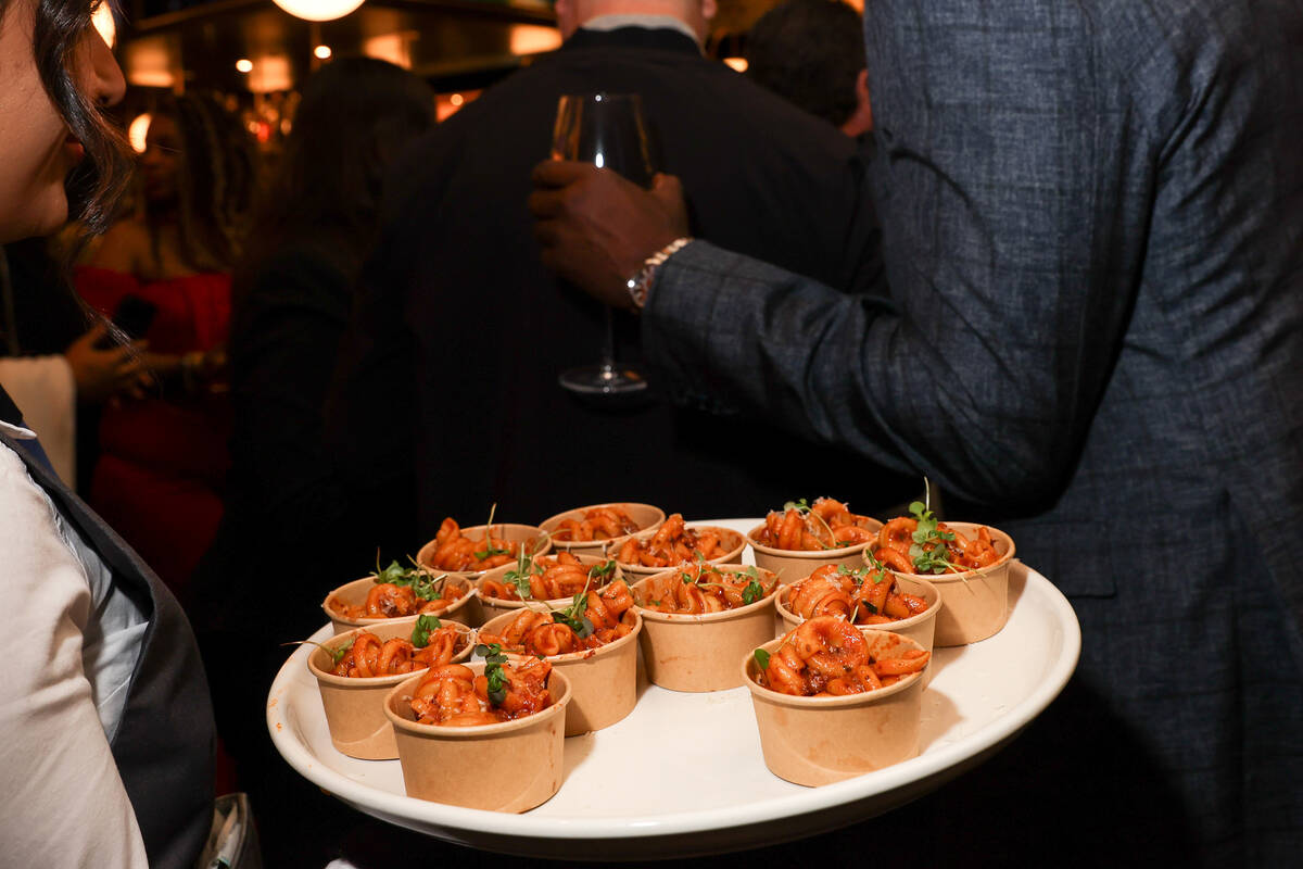 Hors d’oeuvres are served during an opening night party at Emmitt's Vegas in Fashion Sho ...
