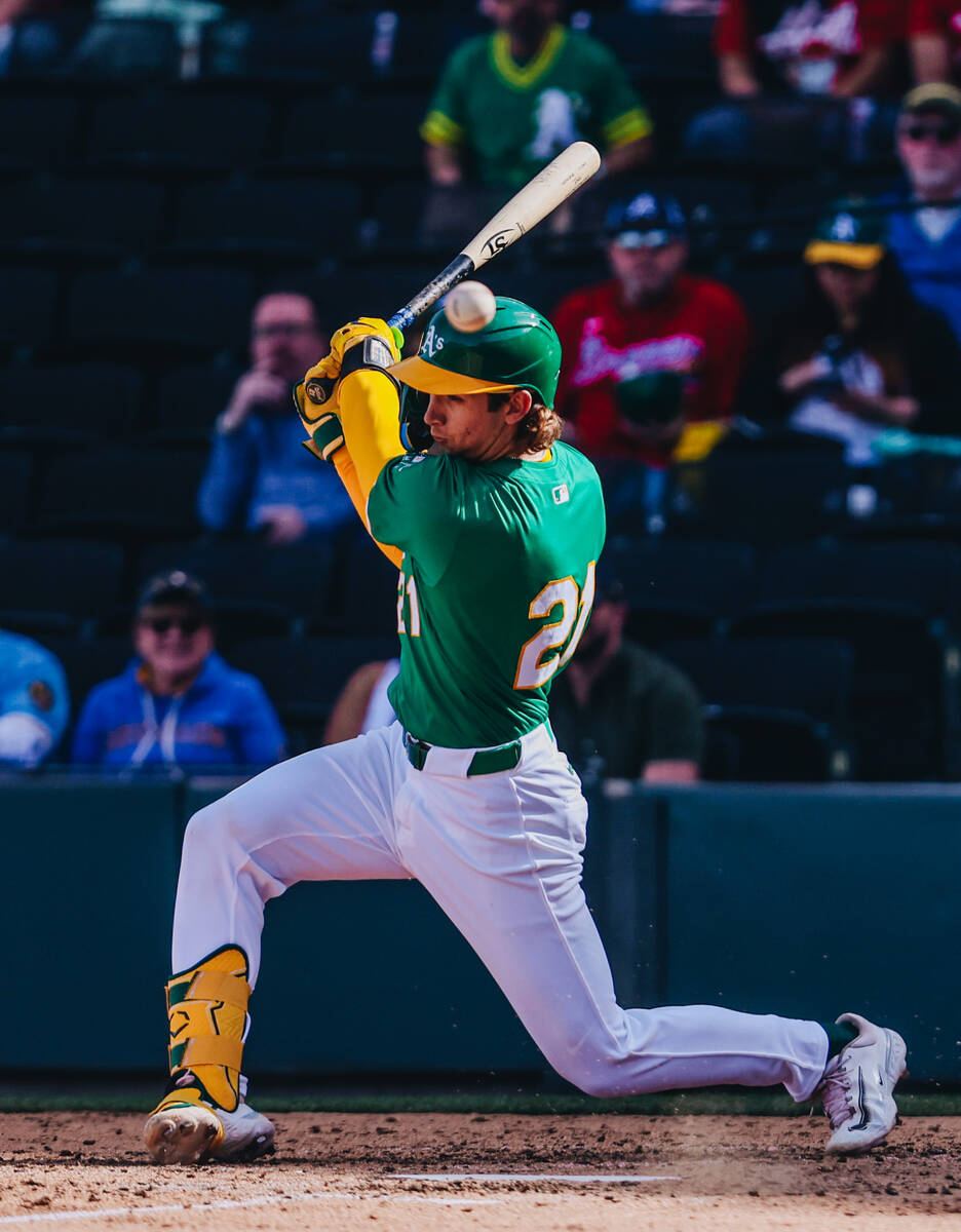 Oakland A’s catcher Tyler Soderstrom (21) hits the ball during a Big League Weekend game ...