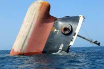 A Rubymar cargo ship is partly submerged off the coast of Yemen, on March 7, 2024. The bulk car ...