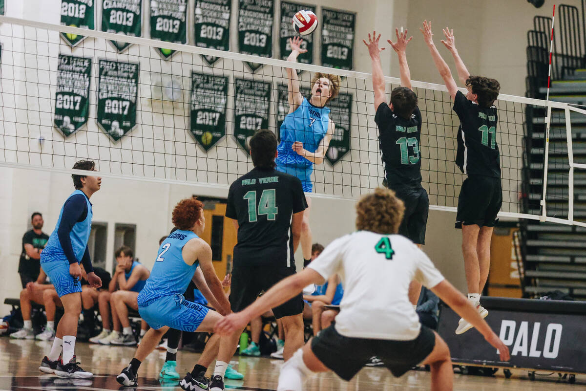 Foothill nightside hitter Corbin Putnam (7) hits the ball over the net during a game against Pa ...