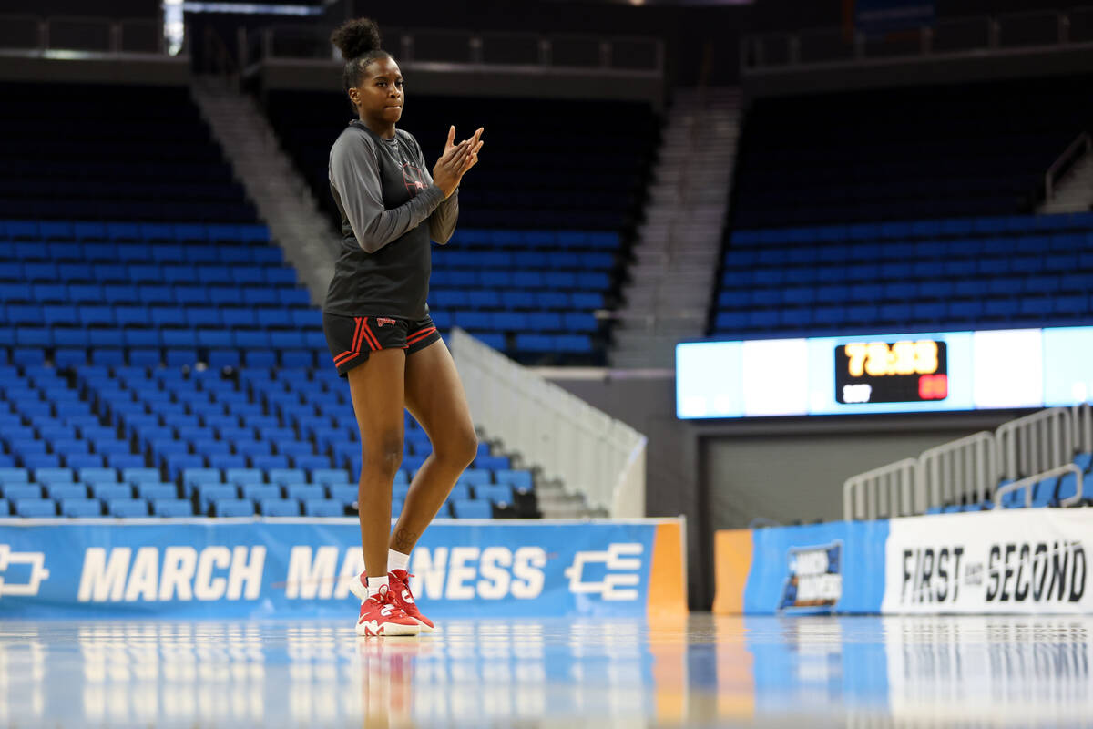 UNLV Lady Rebels center Desi-Rae Young pumps up her team during practice at UCLA’s Paule ...