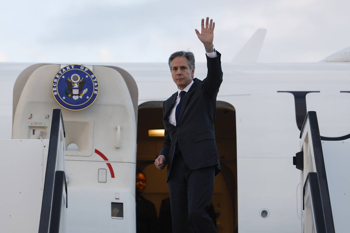 U.S. Secretary of State Antony Blinken gestures, as he departs, at Ben Gurion International air ...