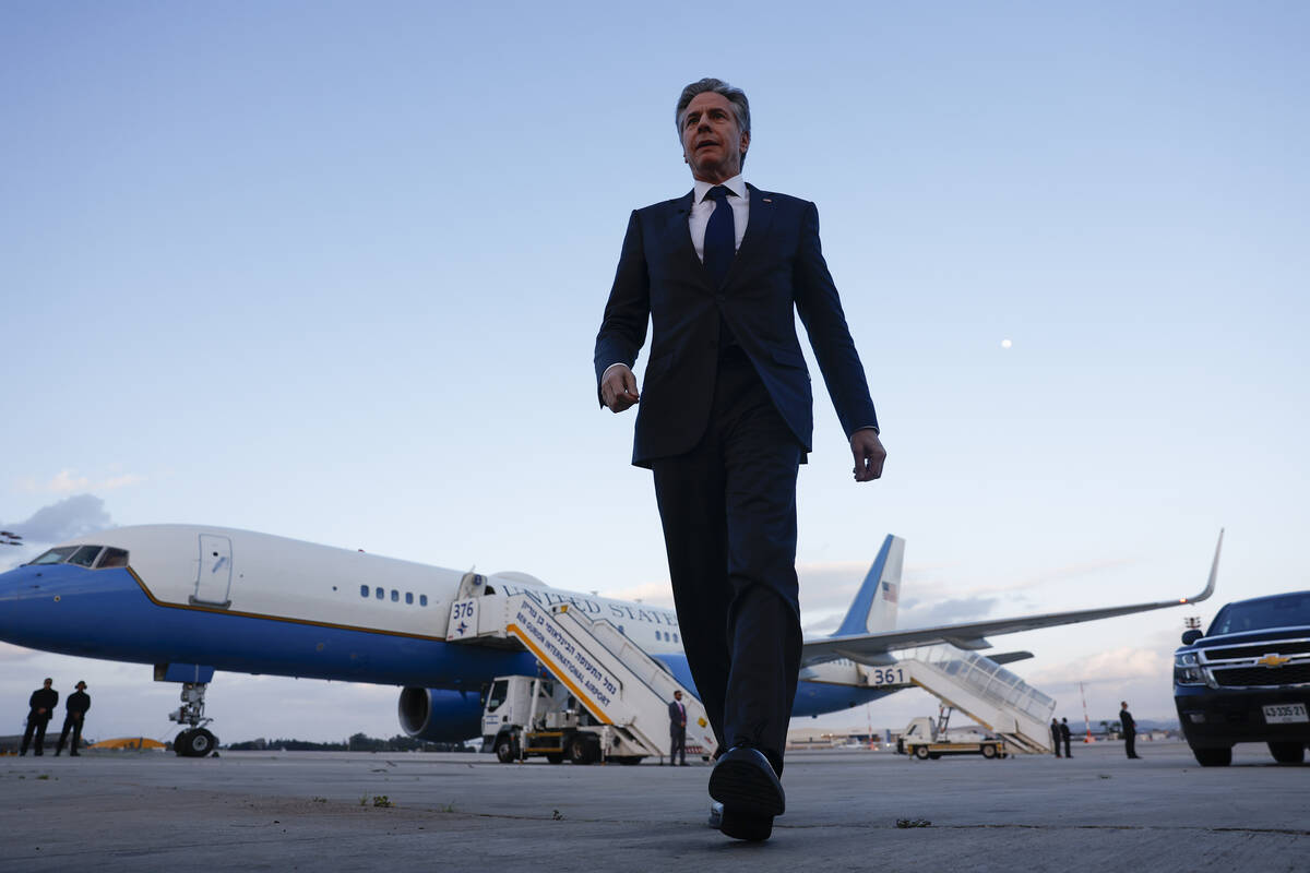 U.S. Secretary of State Antony Blinken walks before departing at Ben Gurion International airpo ...