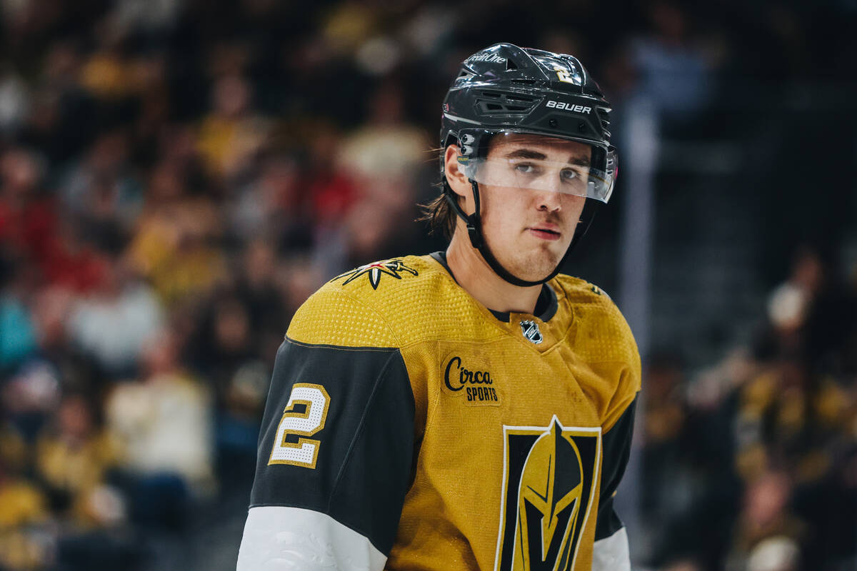 Golden Knights defenseman Zach Whitecloud (2) skates to his position for a puck drop during an ...