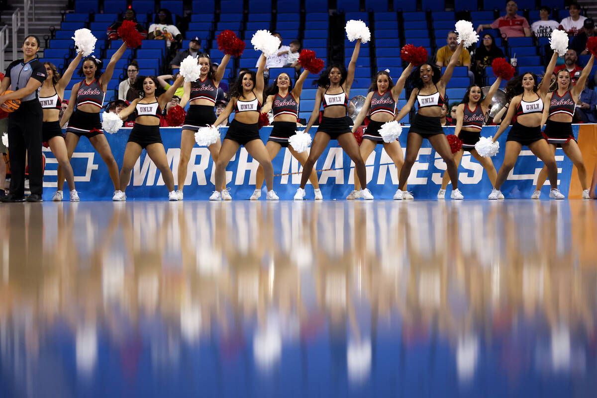 The UNLV Lady Rebels cheerleaders pump up their team during the first half of a first-round col ...