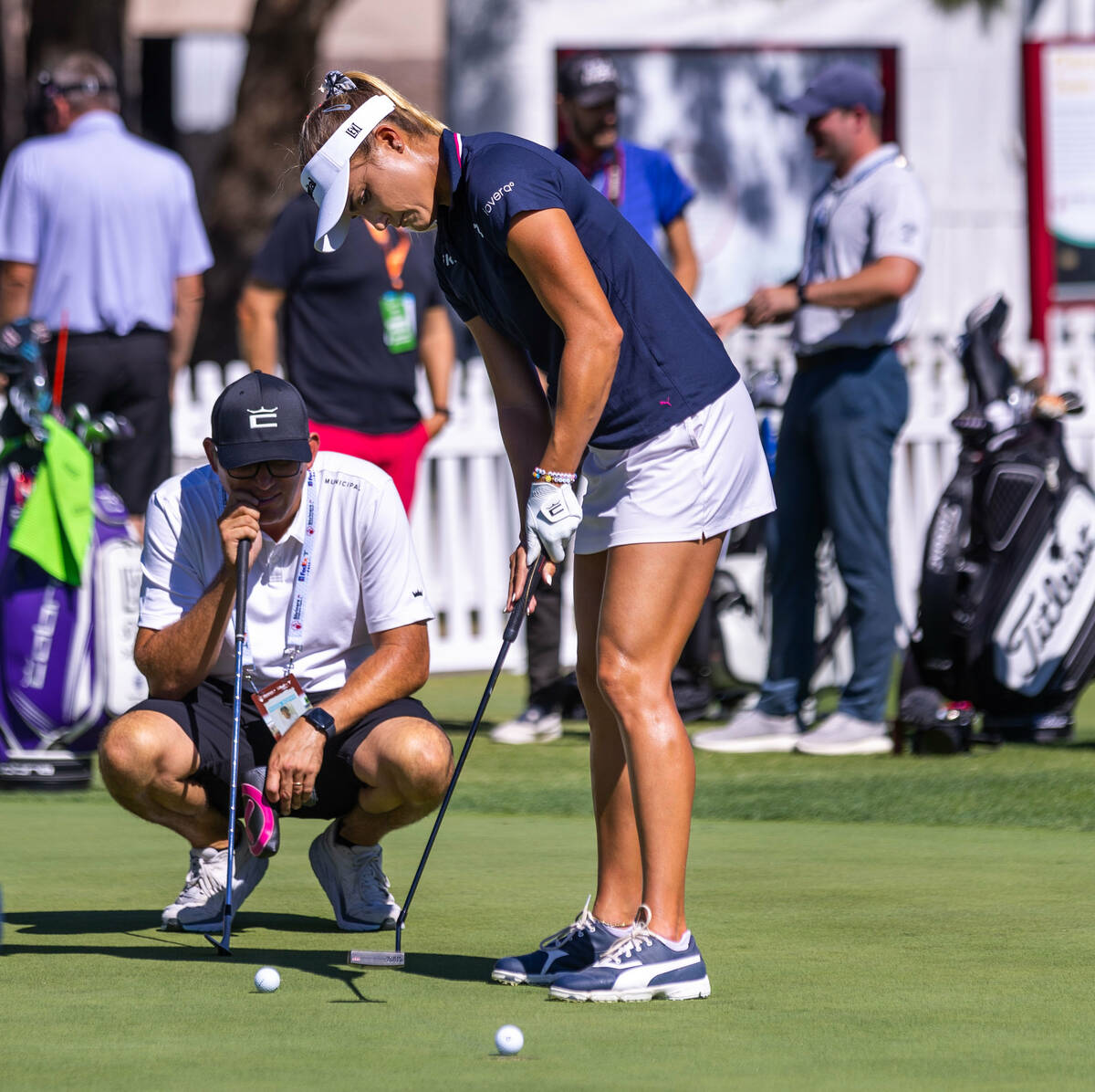 Lexi Thompson takes putting practice as she will be the seventh woman to play in a PGA Tour eve ...