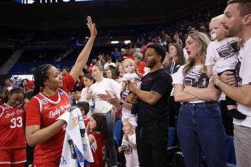 UNLV Lady Rebels forward Alyssa Brown, second from left, waves to supporters after her team los ...