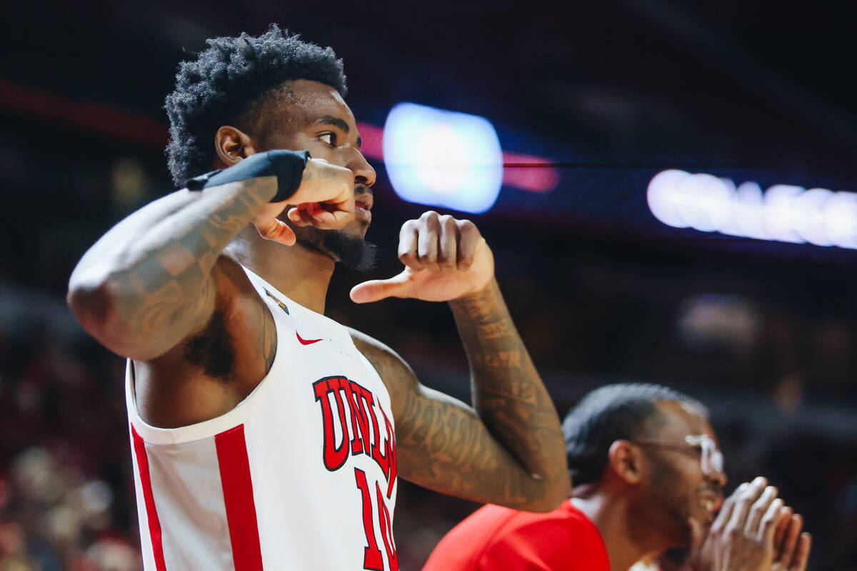 UNLV forward Kalib Boone (10) flexes his arms as UNLV leads during a second-round NIT game betw ...