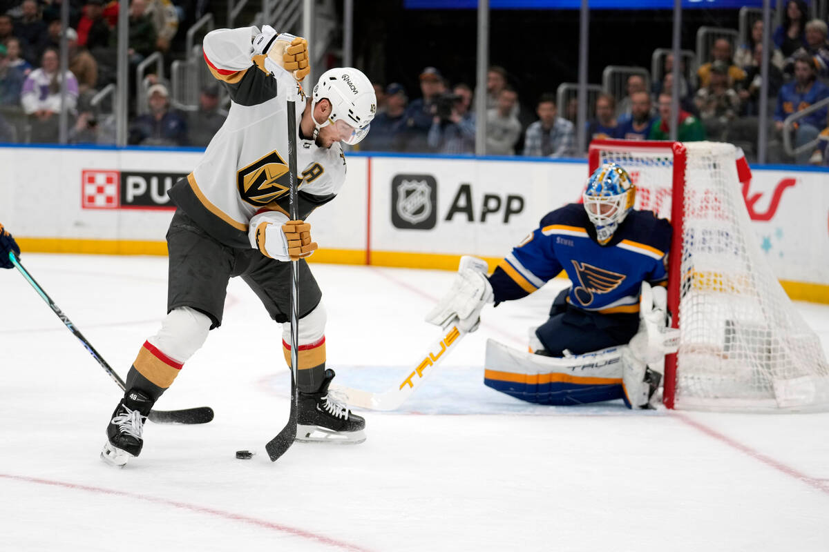 Vegas Golden Knights' Ivan Barbashev (49) passes as St. Louis Blues goaltender Jordan Binningto ...