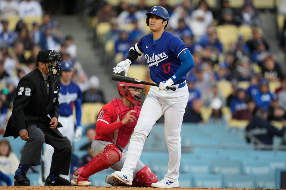Los Angeles Dodgers designated hitter Shohei Ohtani (17) walks during the second inning of a sp ...
