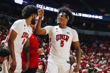 UNLV forward Rob Whaley Jr. (5) gets animated on the bench as UNLV leads during a second-round ...