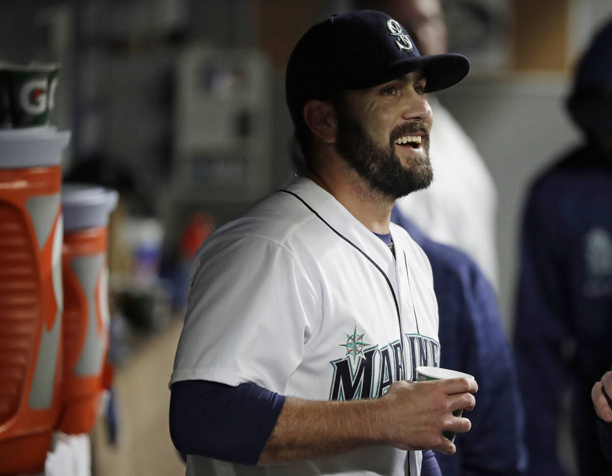 Seattle Mariners relief pitcher Chasen Bradford stands in the dugout after he was pulled in the ...
