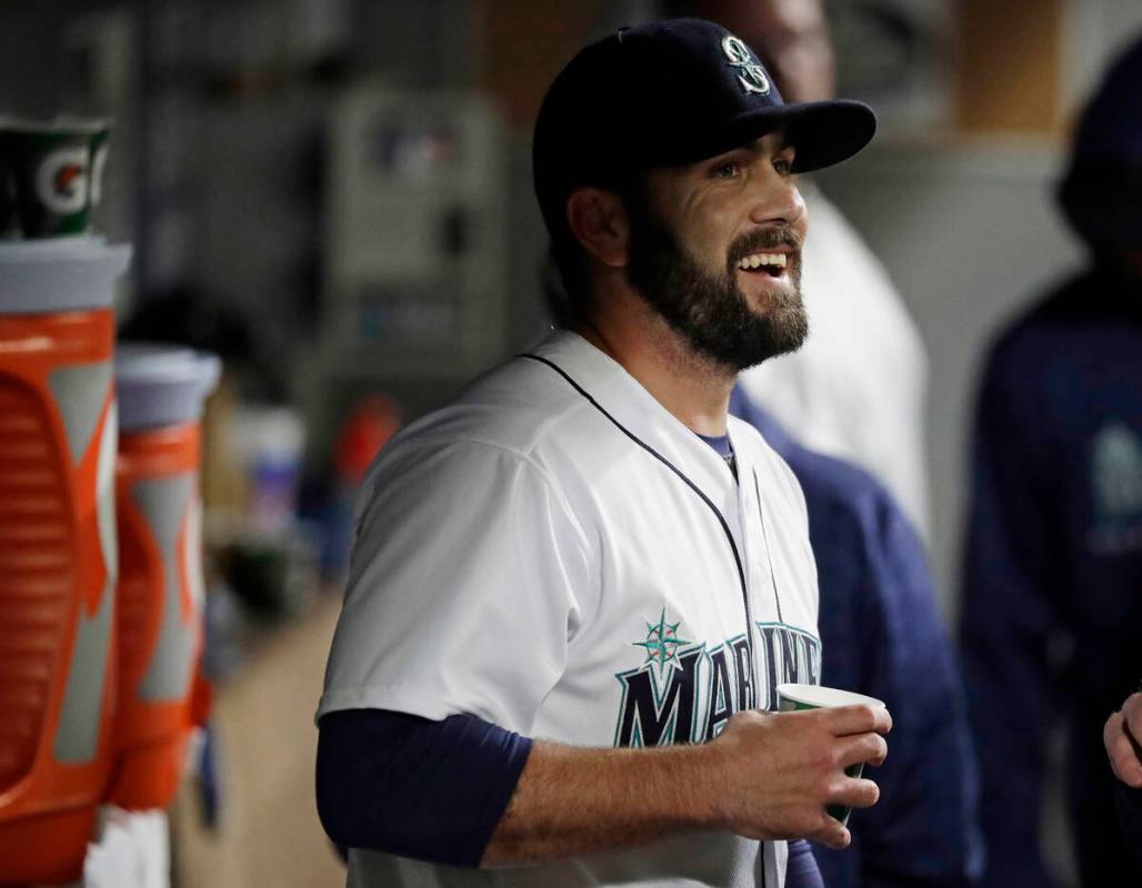 Seattle Mariners relief pitcher Chasen Bradford stands in the dugout after he was pulled in the ...