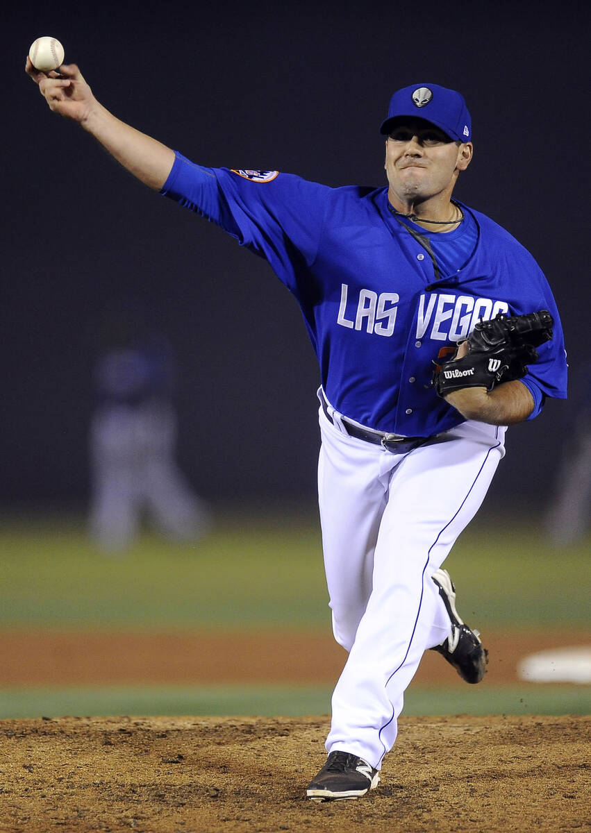 Las Vegas 51s pitcher Chasen Bradford delivers a warm-up pitch in the sixth inning against the ...