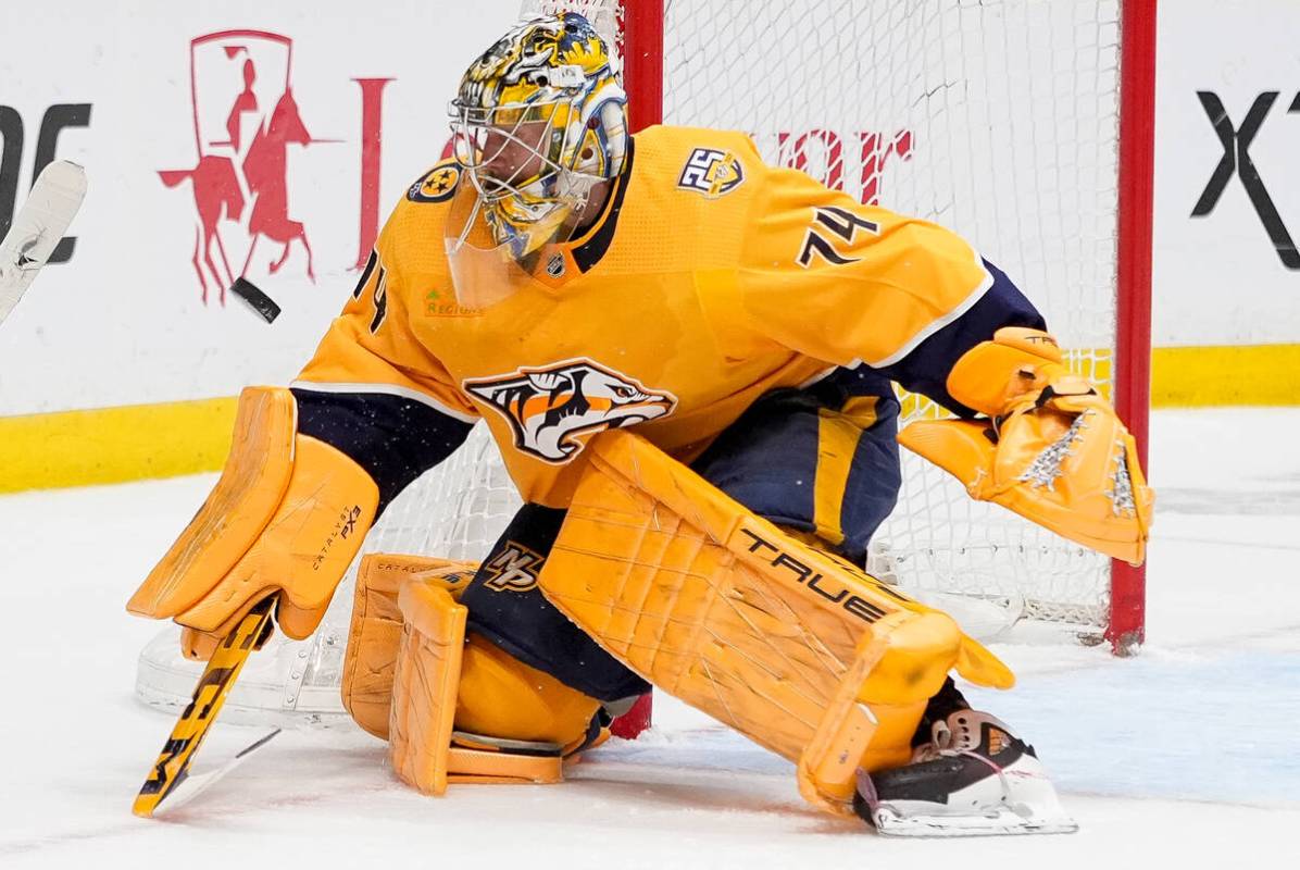 Nashville Predators goaltender Juuse Saros (74) blocks a shot on goal during the first period o ...