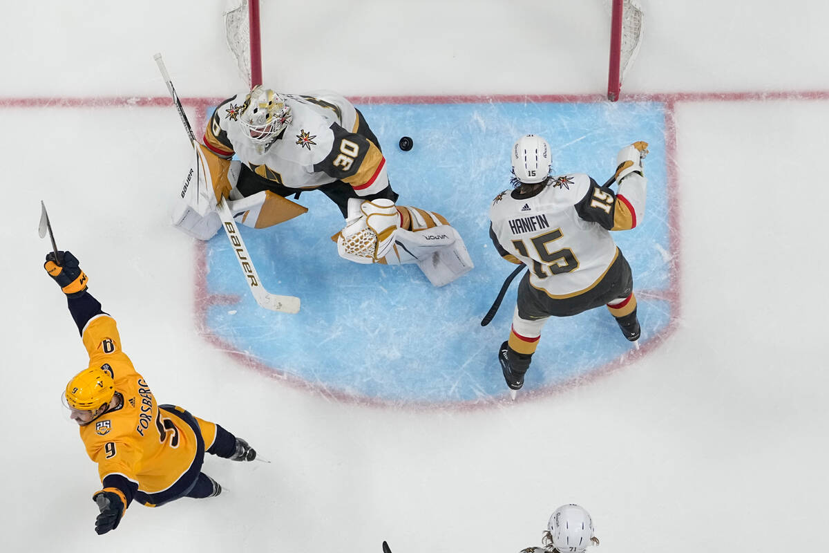 Nashville Predators left wing Filip Forsberg (9) celebrates power play goal by teammate Gustav ...