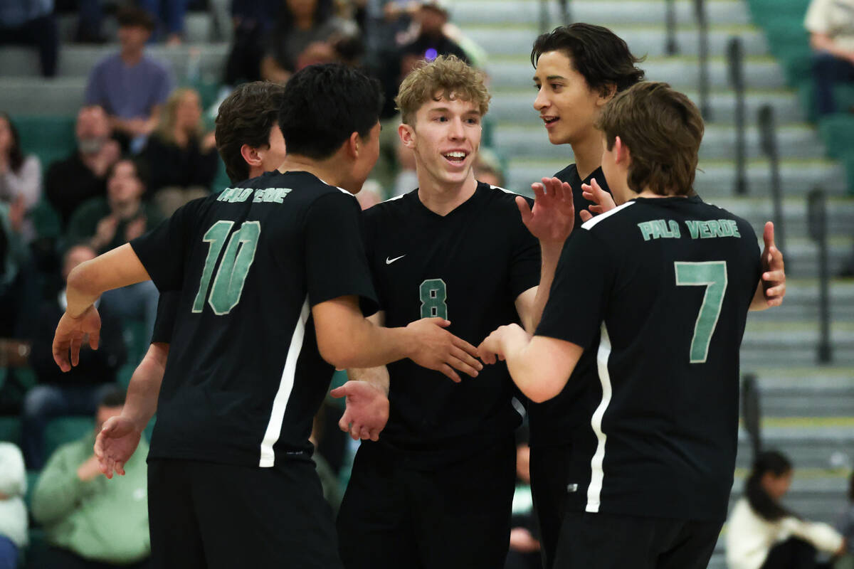 Palo Verde celebrates a point during a boys high school volleyball game against Coronado on Tue ...