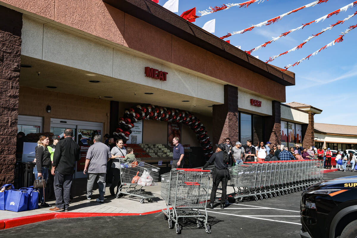 Customers line up to shop at Superior Grocers at the grand opening in East Las Vegas, Wednesday ...