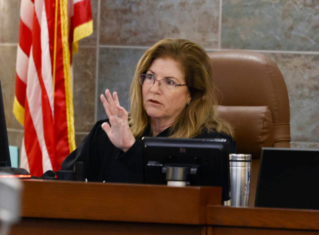District Judge Susan Johnson presides over Deobra Redden's, who was captured on video attacking ...
