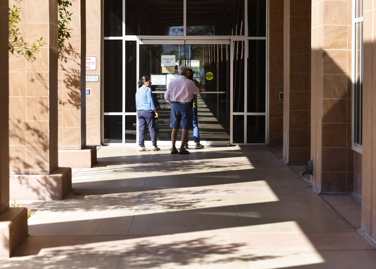 People enter the Grant Sawyer state office building, on Wednesday, March 27, 2024, in Las Vegas ...