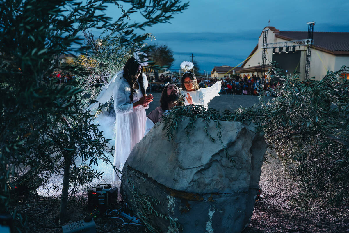 The Stations of the Cross are acted out during a live performance for Good Friday at St. Bridge ...