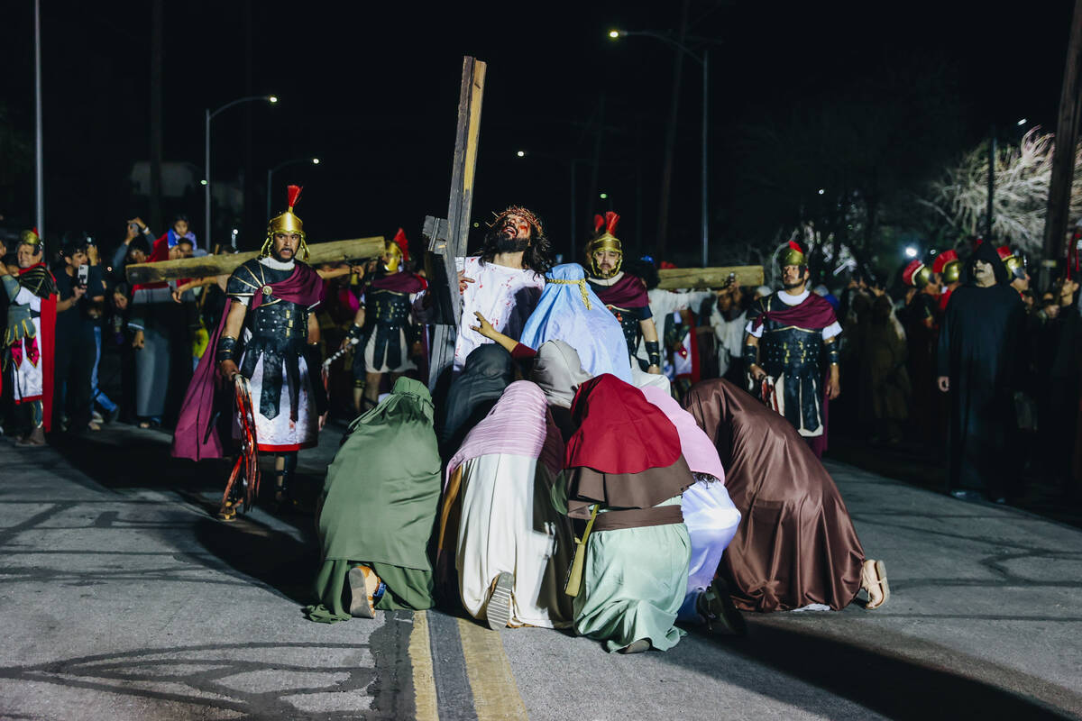 The Stations of the Cross are acted out during a live performance for Good Friday at St. Bridge ...