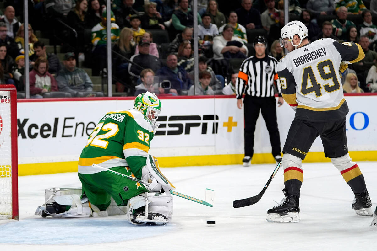 Minnesota Wild goaltender Filip Gustavsson (32) looks to stop a shot as Vegas Golden Knights ce ...