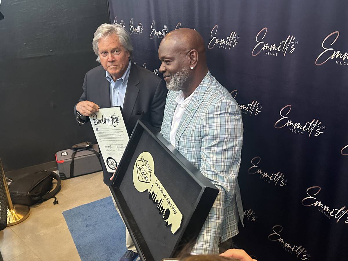 Clark County Commissioner Tick Segerblom is shown with NFL legend Emmitt Smith at Smith's new r ...
