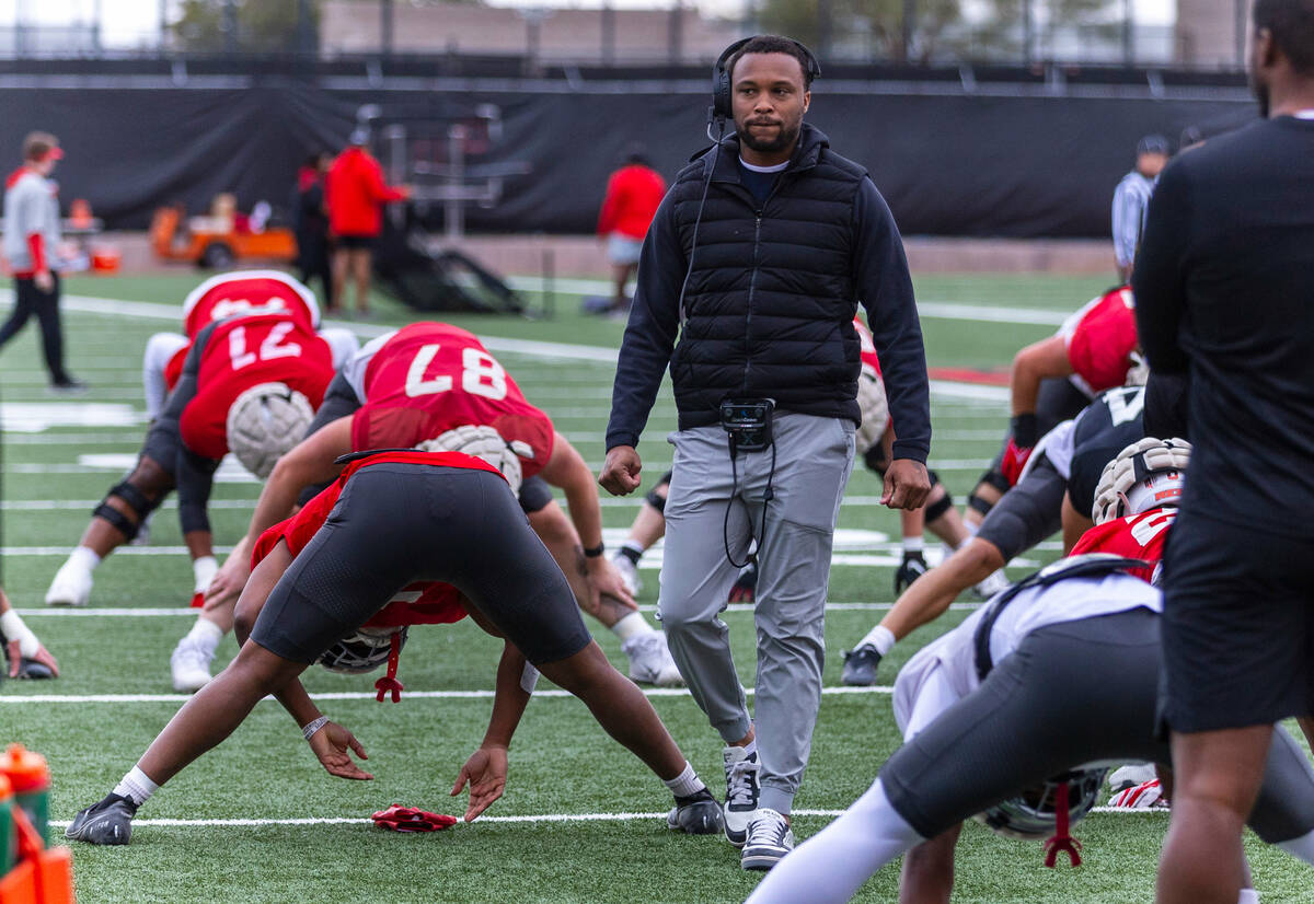 UNLV offensive coordinator Brennan Marion observes his players during spring football practice ...