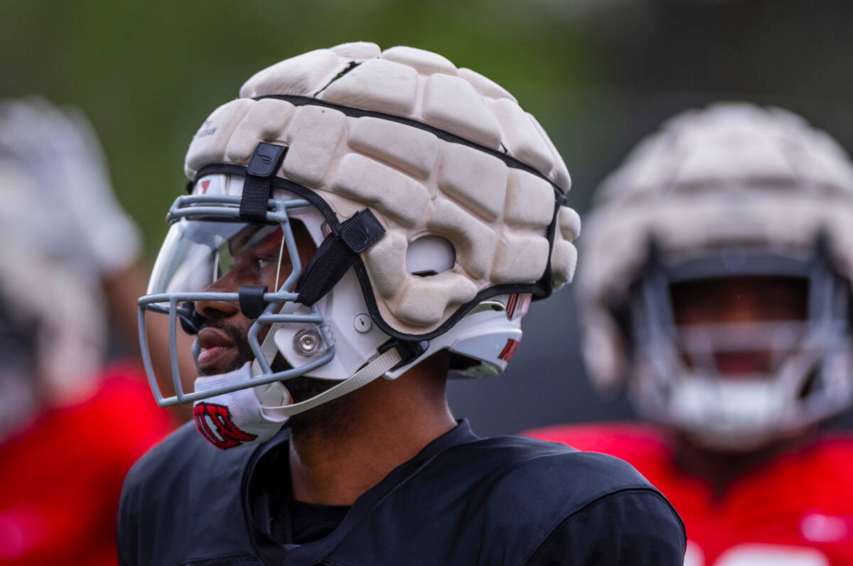 UNLV quarterback Hajj-Malik Williams (6) looks to teammates during spring football practice at ...