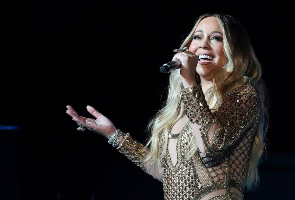 FILE - Mariah Carey performs during a concert celebrating Dubai Expo 2020 One Year to Go in Dub ...