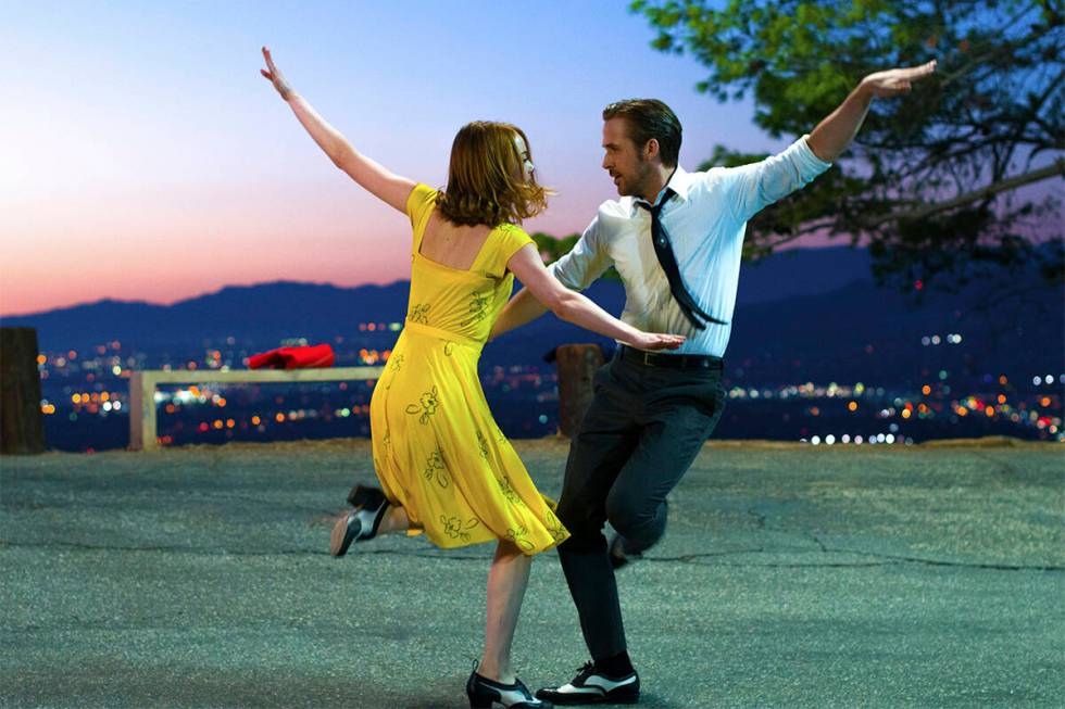 This image released by Lionsgate shows Ryan Gosling, right, and Emma Stone in a scene from, &qu ...