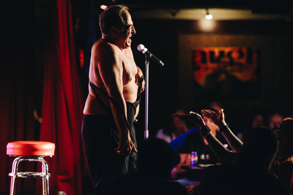 Comedian Harry Basil perform a skit for a crowd during “Last Laughs at the Trop” ...