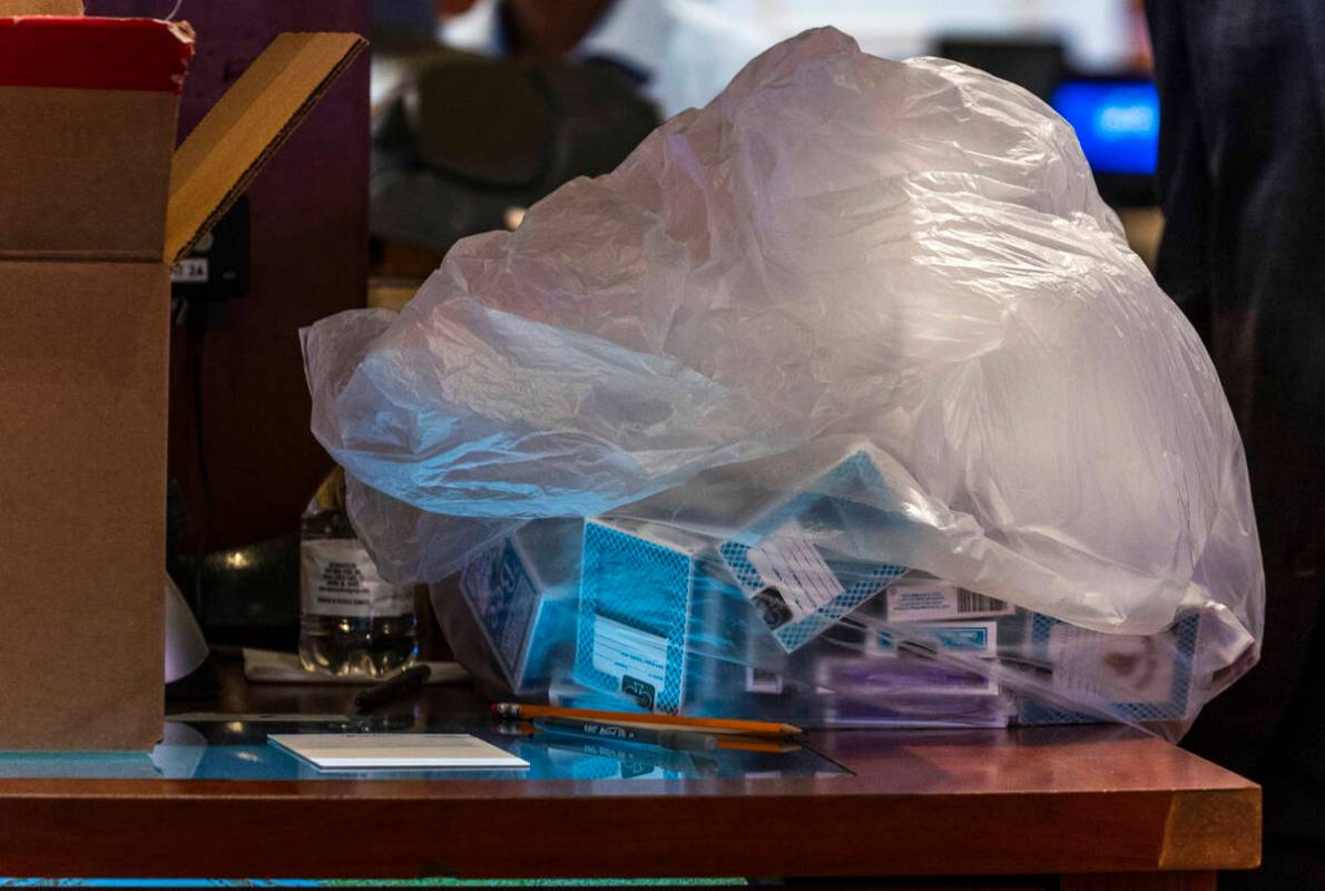 A bag of playing cards is set aside following the final table games during the final night of g ...