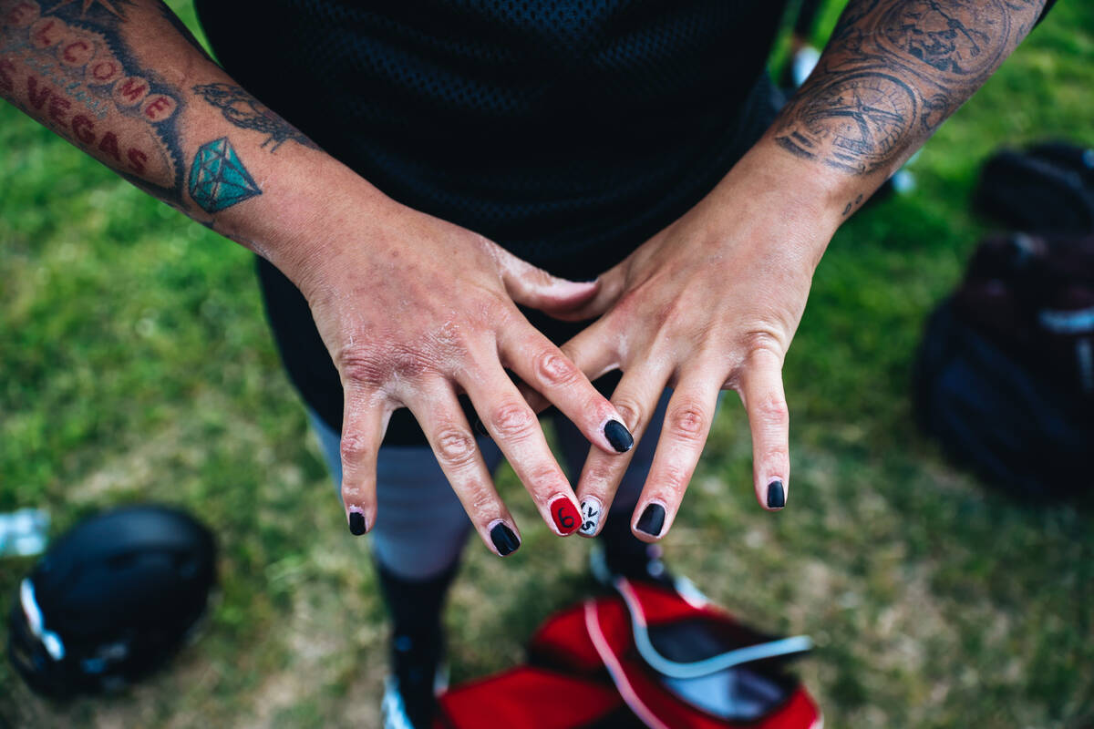 Sigourney Gonzalez, a quarterback for the Las Vegas Silver Stars, shows off nail designs that h ...