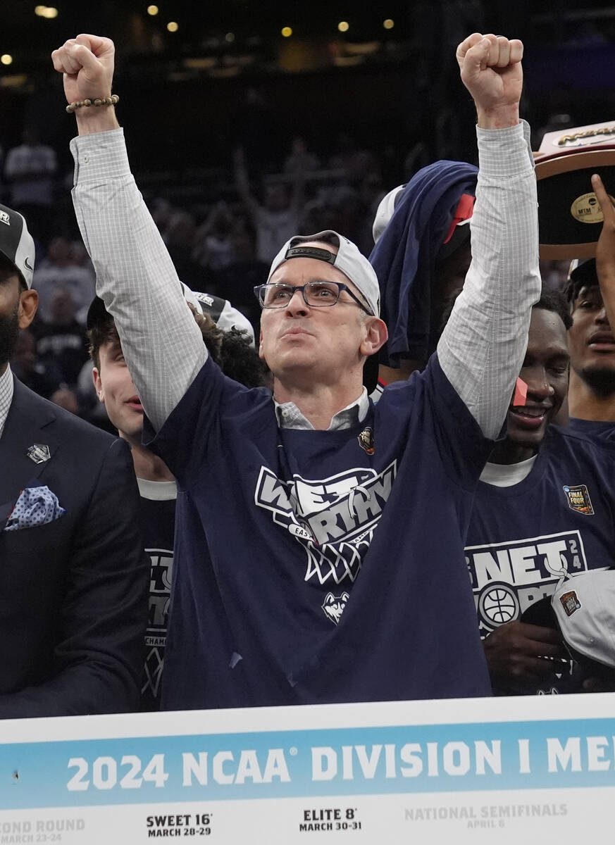 UConn head coach Dan Hurley celebrates after defeating Illinois in the Elite 8 college basketba ...