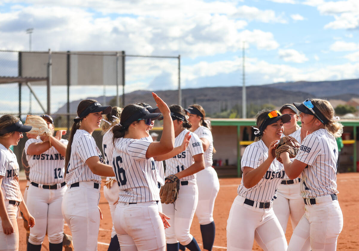 The Shadow Ridge High School softball team cheers during a game against Palo Verde High School ...