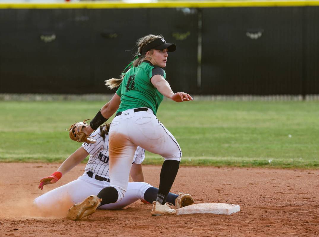 Shadow Ridge High School’s Carmella Garganese (2) reaches to make it safe to second base ...