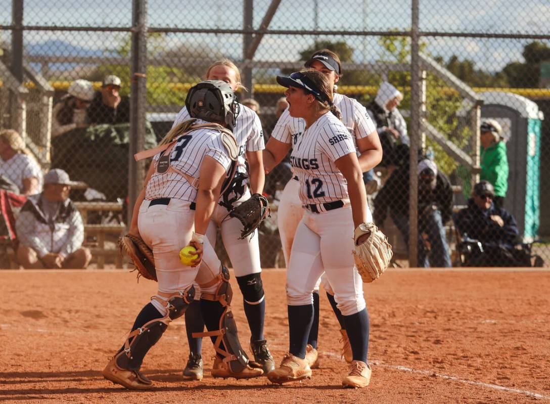 The Shadow Ridge High School softball team cheers during a game against Palo Verde High School ...