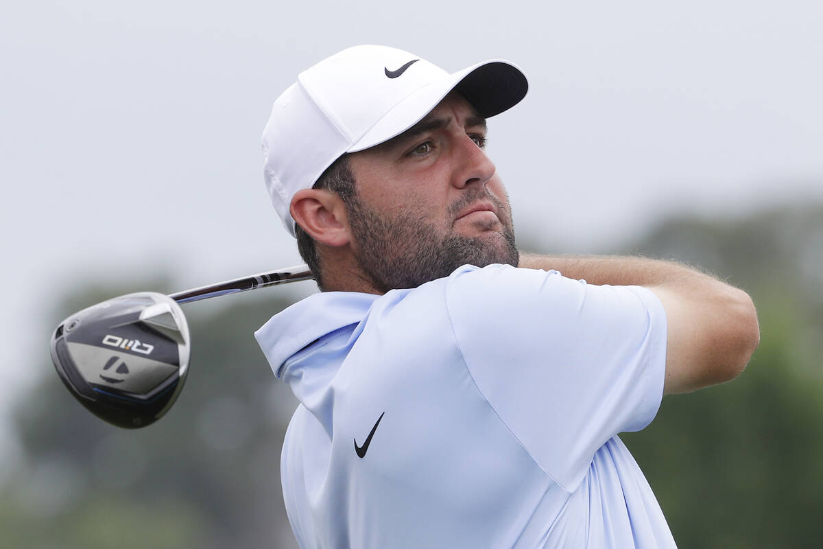 Scottie Scheffler watches his tee shot on the 10th hole during the final round of the Houston O ...