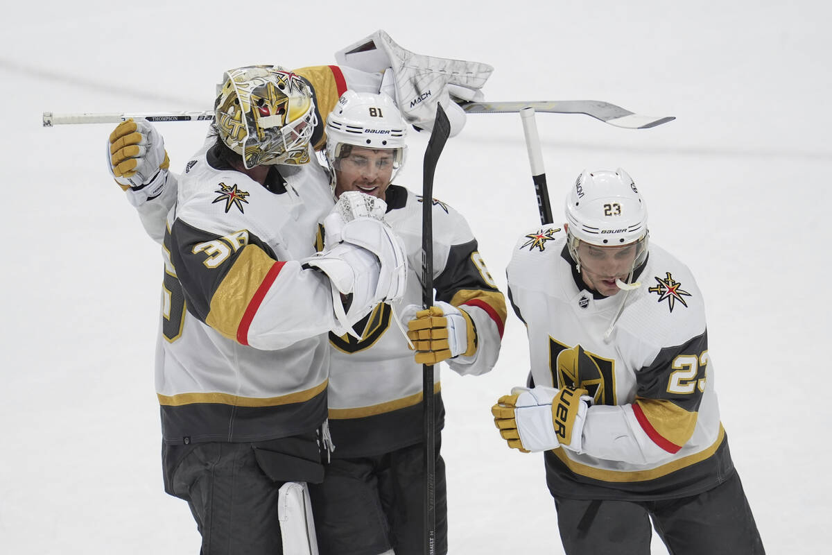 Vegas Golden Knights goaltender Logan Thompson, left; right wing Jonathan Marchessault, center; ...